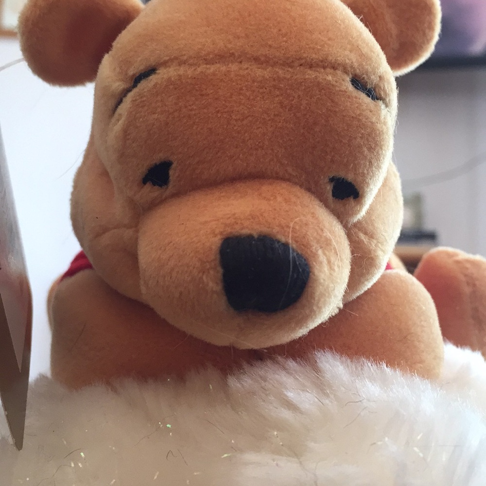 Disney UK Pooh on a cloud